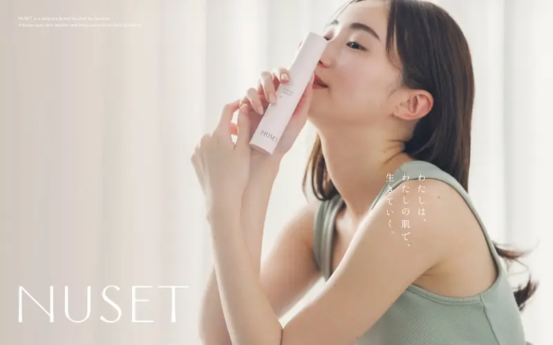 NUSET 웹사이트 데스크톱 화면 스크린샷 — 다크 모드, 타이포그래피 스타일